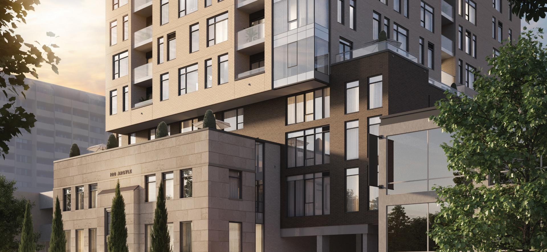 The heritage limestone base and bronze-brick tower of Artefact on Argyle by day